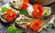 Essbare Blüten der Kapuzinerkresse: Würzen viele Speisen